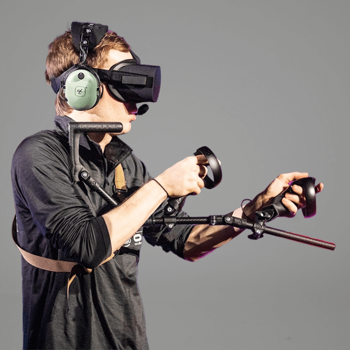 a vr esport player aiming with a magtube gun stock